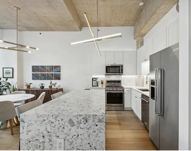 125 E 13th Street - Photo Thumbnail 4