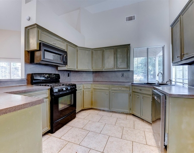1906 Woodhue Drive - Photo Thumbnail 2