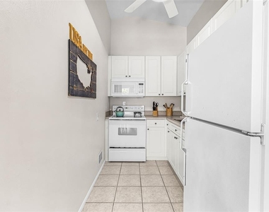 6020 Midnight Pass Road - Photo Thumbnail 10