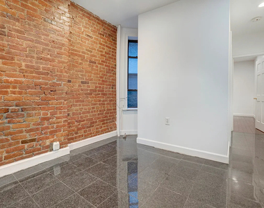 410 East 73rd Street - Photo Thumbnail 2