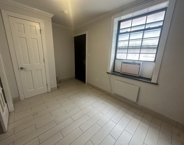 221 East 11th Street - Photo Thumbnail 3
