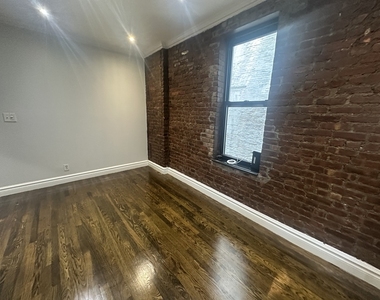 416 East 13th Street - Photo Thumbnail 2