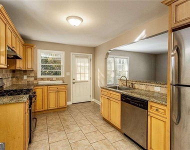 2720 Stonecreek Road Se - Photo Thumbnail 5