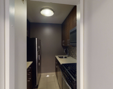 401 E 34th St - Photo Thumbnail 1