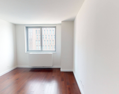 401 E 34th St - Photo Thumbnail 3