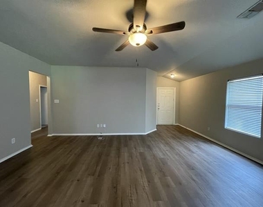 7404 Fossil Creek Drive - Photo Thumbnail 1