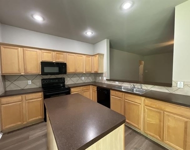 7404 Fossil Creek Drive - Photo Thumbnail 3