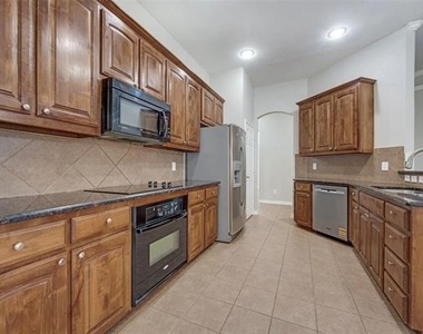 14900 Frisco Ranch Drive - Photo Thumbnail 6