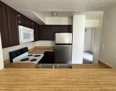 9833 Walnut Street - Photo Thumbnail 4