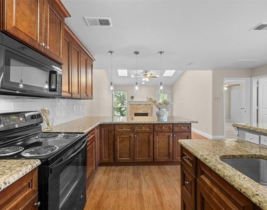 5616 Preston Oaks Road - Photo Thumbnail 8