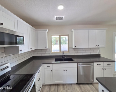 5835 E Acoma Drive - Photo Thumbnail 13