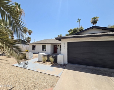 5835 E Acoma Drive - Photo Thumbnail 1