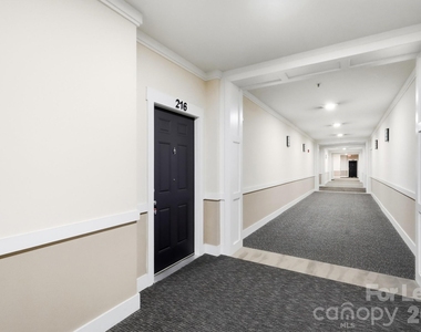 1000 E Woodlawn Road - Photo Thumbnail 10