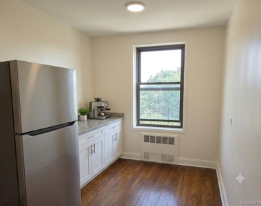 89-20 55 Avenue - Photo Thumbnail 3
