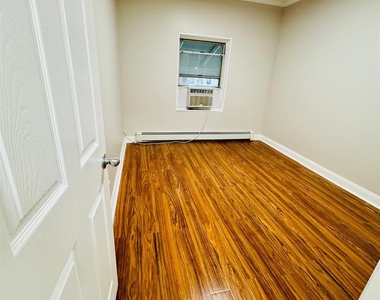 105-07 101st Road - Photo Thumbnail 1