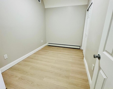 105-07 101st Road - Photo Thumbnail 11