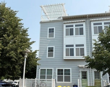 6416 Ocean Avenue N - Photo Thumbnail 1