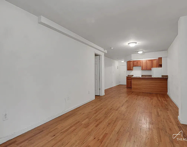 242 W 21st Street - Photo Thumbnail 2