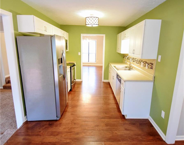6933 Woodmark Drive - Photo Thumbnail 11