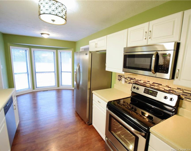 6933 Woodmark Drive - Photo Thumbnail 8