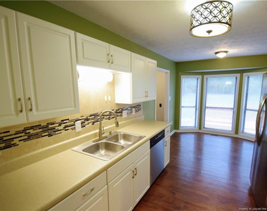 6933 Woodmark Drive - Photo Thumbnail 7