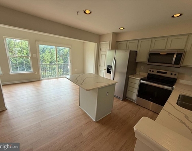 7123 Maiden Point Place - Photo Thumbnail 7