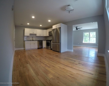 517 Asbury Avenue - Photo Thumbnail 2