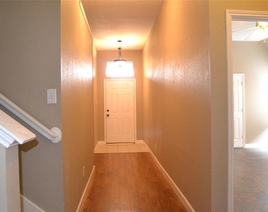 6005 Hidden Pine Lane - Photo Thumbnail 1