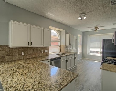 6418 Wildhaven Drive - Photo Thumbnail 11