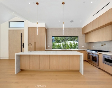 6114 Sadring Avenue - Photo Thumbnail 1