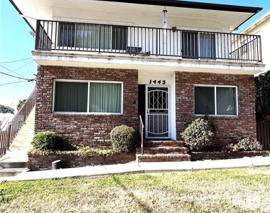 1443 W 9th Street - Photo Thumbnail 2