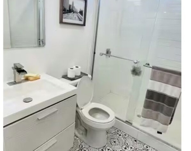 335 E 65th Street - Photo Thumbnail 2
