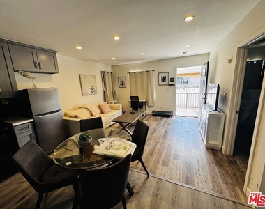 335 E 65th Street - Photo Thumbnail 6