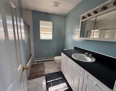 611 Peconic Avenue - Photo Thumbnail 9