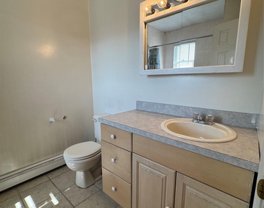 611 Peconic Avenue - Photo Thumbnail 12