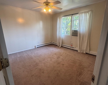 611 Peconic Avenue - Photo Thumbnail 6