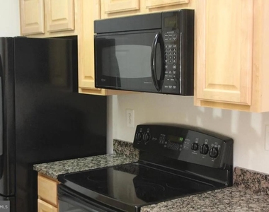 1591 Spring Gate Drive - Photo Thumbnail 4