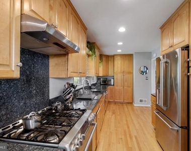 9504 Wadsworth Drive - Photo Thumbnail 13
