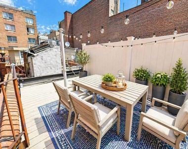 221 East 23rd Street - Photo Thumbnail 2