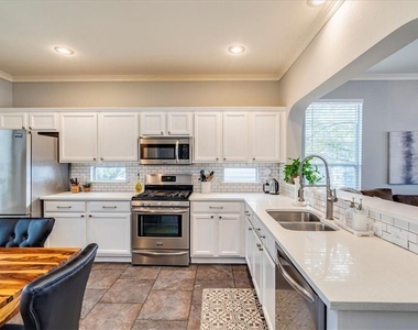 1202 Cardigan St - Photo Thumbnail 5