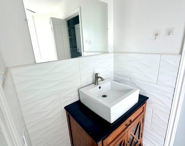 7901 Cambridge Street - Photo Thumbnail 4