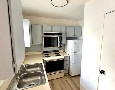 7901 Cambridge Street - Photo Thumbnail 3