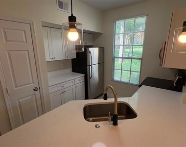 6348 Raleigh Street - Photo Thumbnail 6