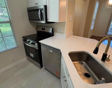 6348 Raleigh Street - Photo Thumbnail 5