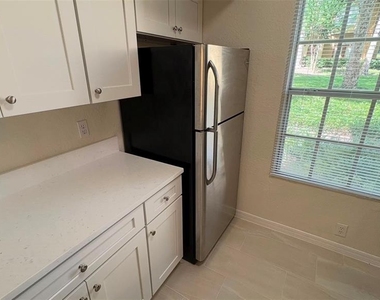 6348 Raleigh Street - Photo Thumbnail 4