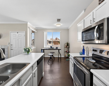 7009 E Acoma Drive - Photo Thumbnail 4