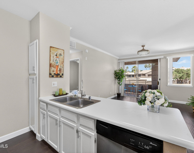 7009 E Acoma Drive - Photo Thumbnail 3