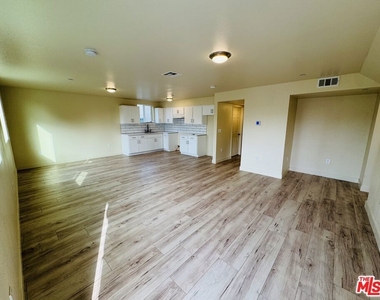 851 E 76th Place - Photo Thumbnail 1