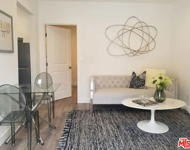 335 E 65th Street - Photo Thumbnail 1