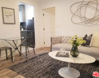 335 E 65th Street - Photo Thumbnail 2